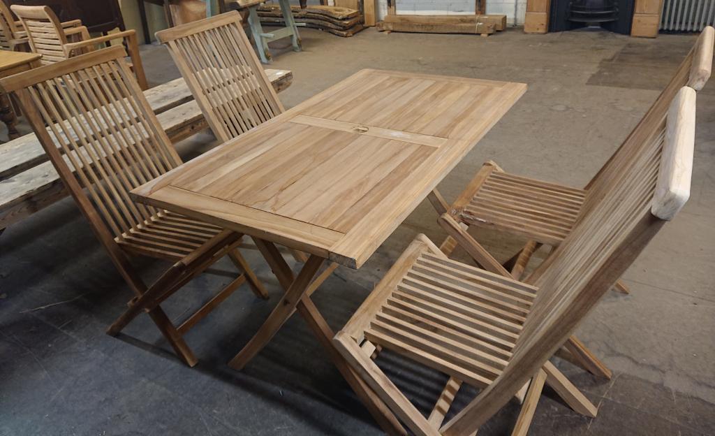 <p>Teak Table with 4 Chairs</p><p>Table 120 cm x 70 cm</p><p>Table and Chairs fold up</p>